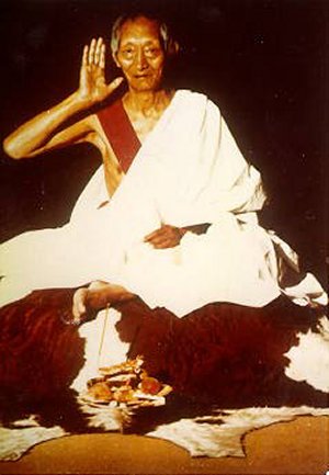 His Eminence Kalu Rinpoche in Milarepa pose.